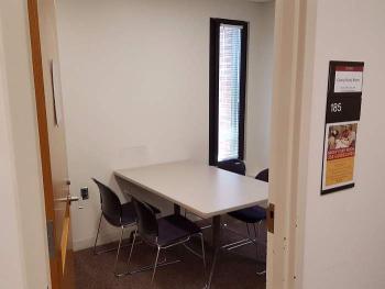Enclosed room with table and chairs